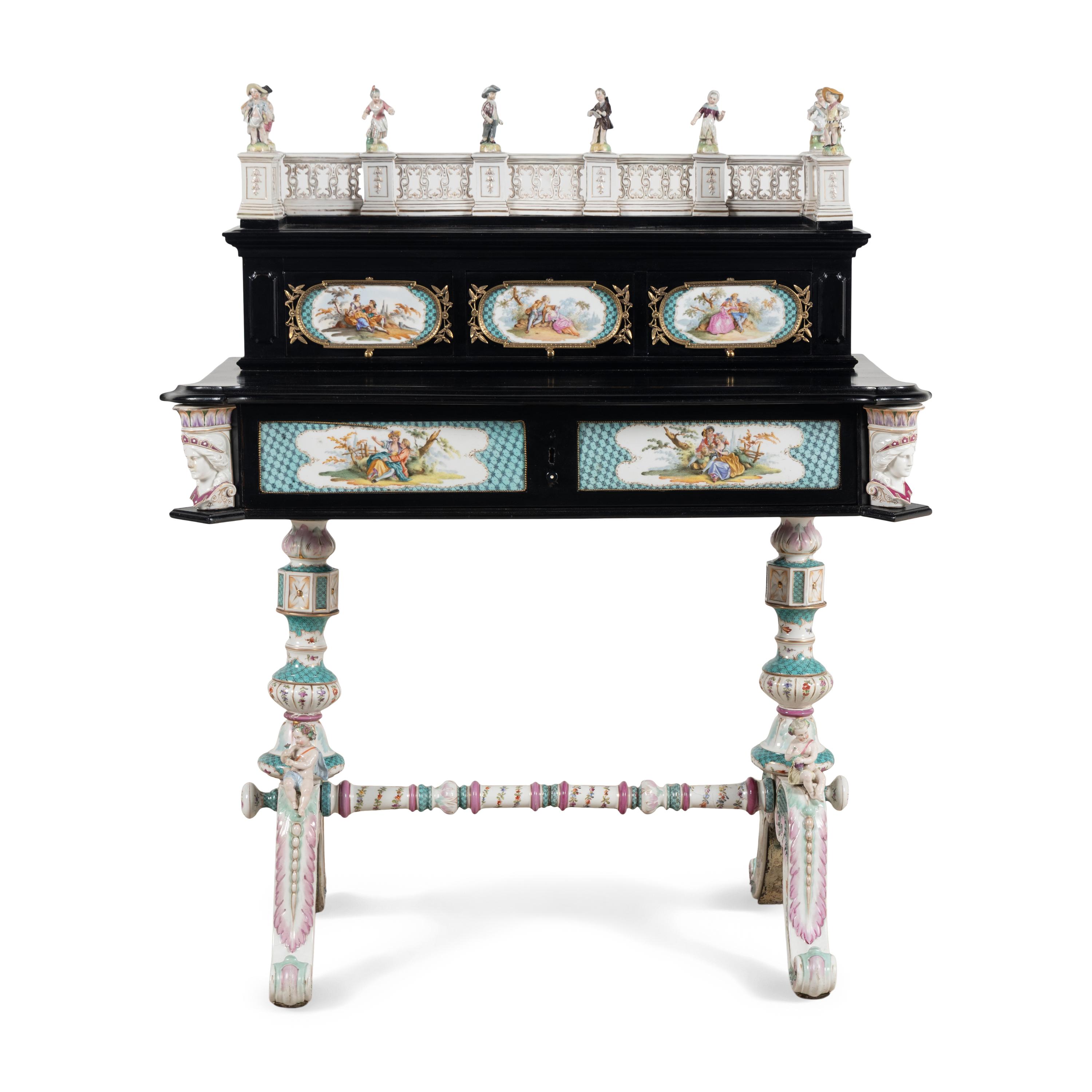 A German Ebonized and Porcelain Mounted Bureau