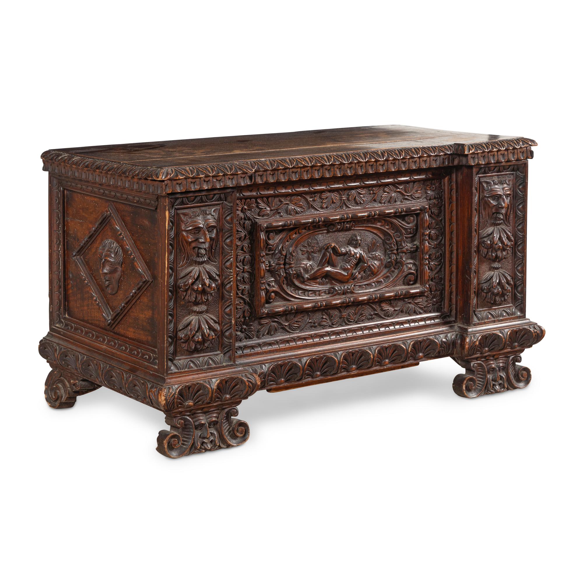 An Italian Carved Walnut Coffer