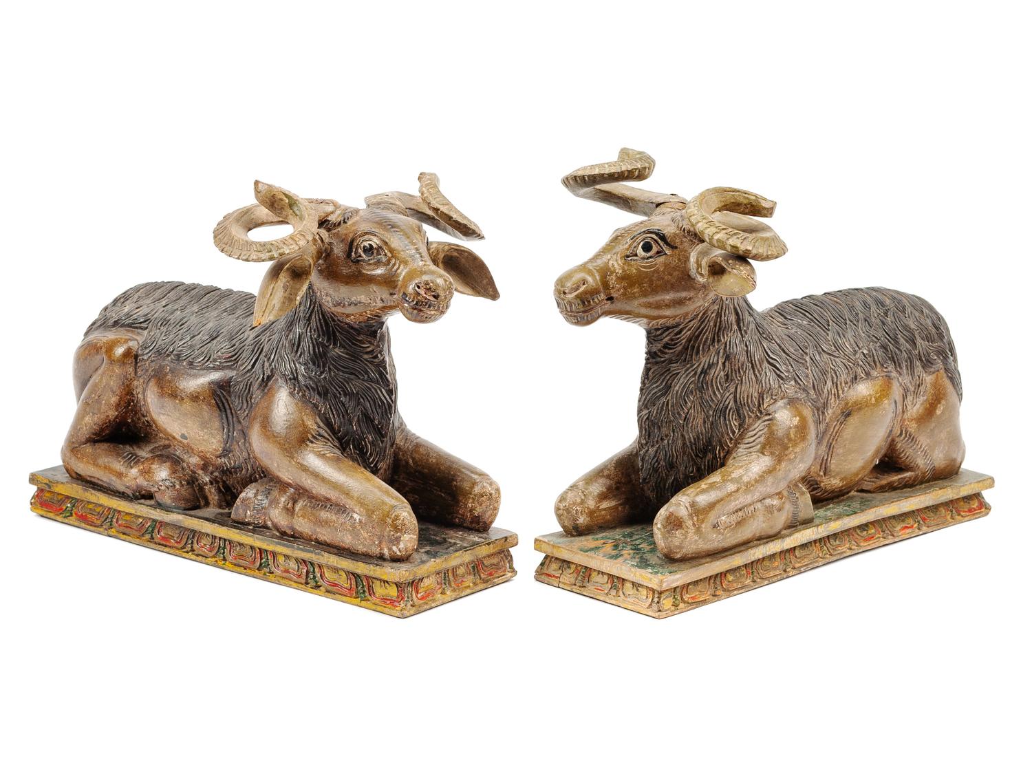 A Pair of Southeast Asian Carved and Polychromed Figures