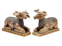 A Pair of Southeast Asian Carved and Polychromed Figures