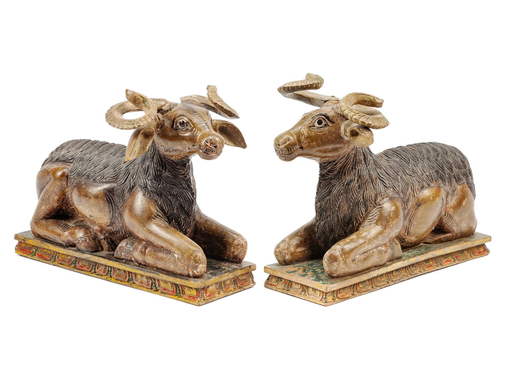 A Pair of Southeast Asian Carved and Polychromed Figures