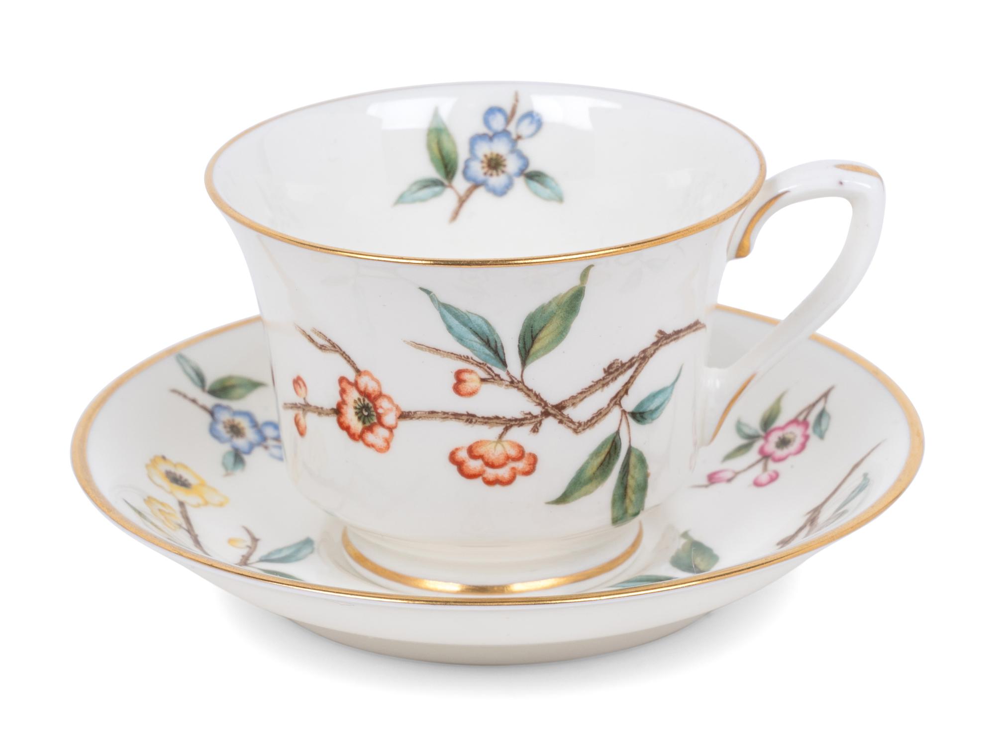 A Set of Eleven Royal Worcester Porcelain Teacups and Saucers