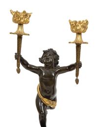 A French Gilt and Patinated Bronze and Rouge Marble Clock Garniture