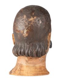 A Carved and Painted Wood Head of a Mustachioed Man