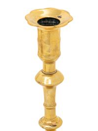 A Group of Eight English Brass Candlesticks