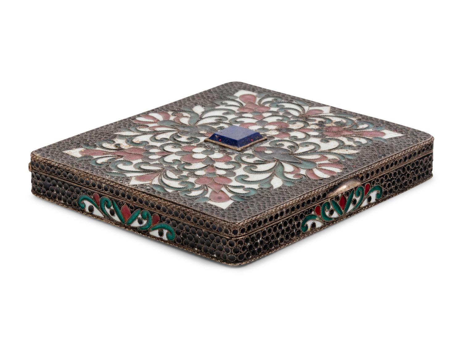 A Russian Enameled Silver and Lapis Lazuli Inset Cigarette Case
