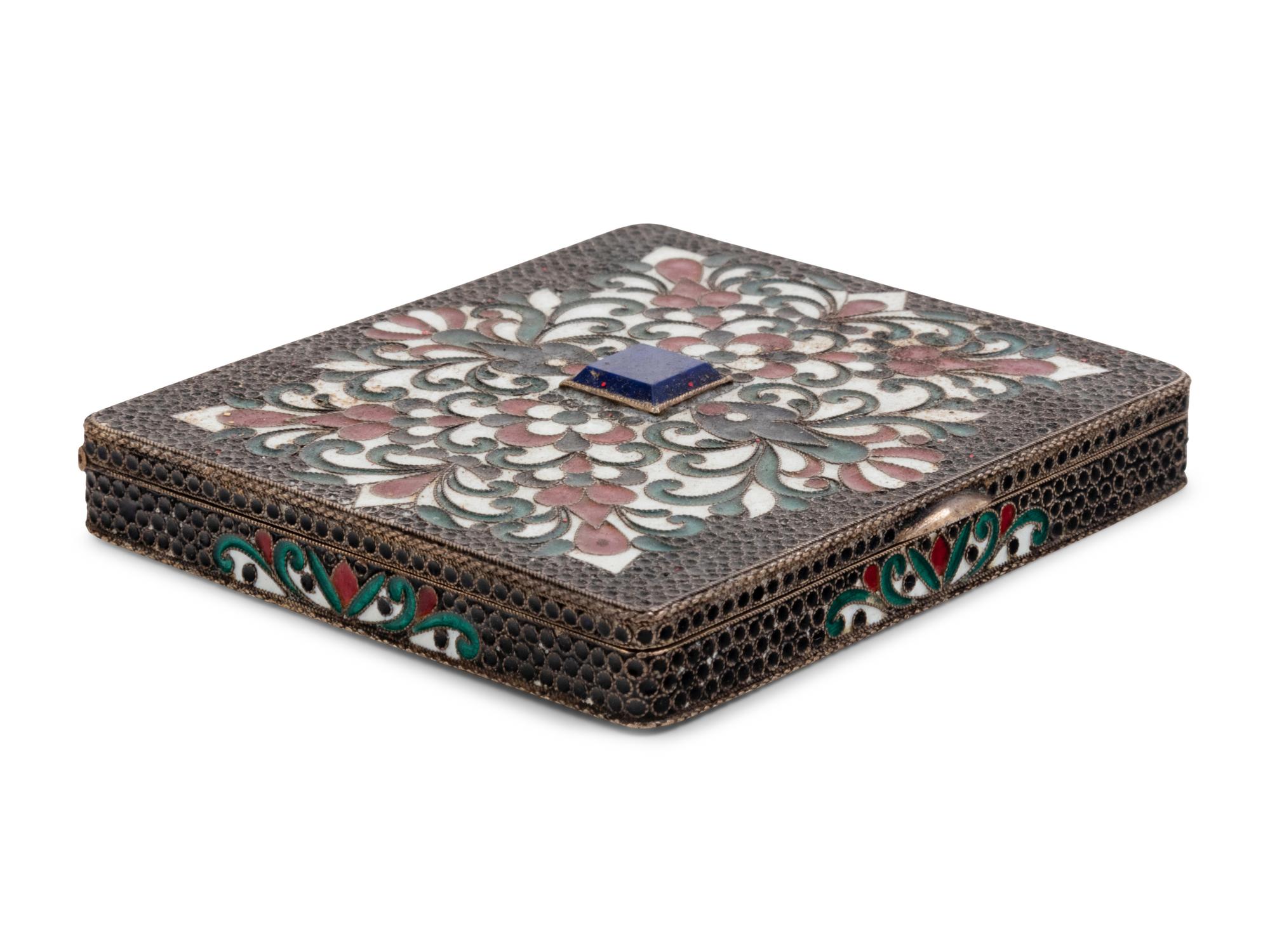 A Russian Enameled Silver and Lapis Lazuli Inset Cigarette Case