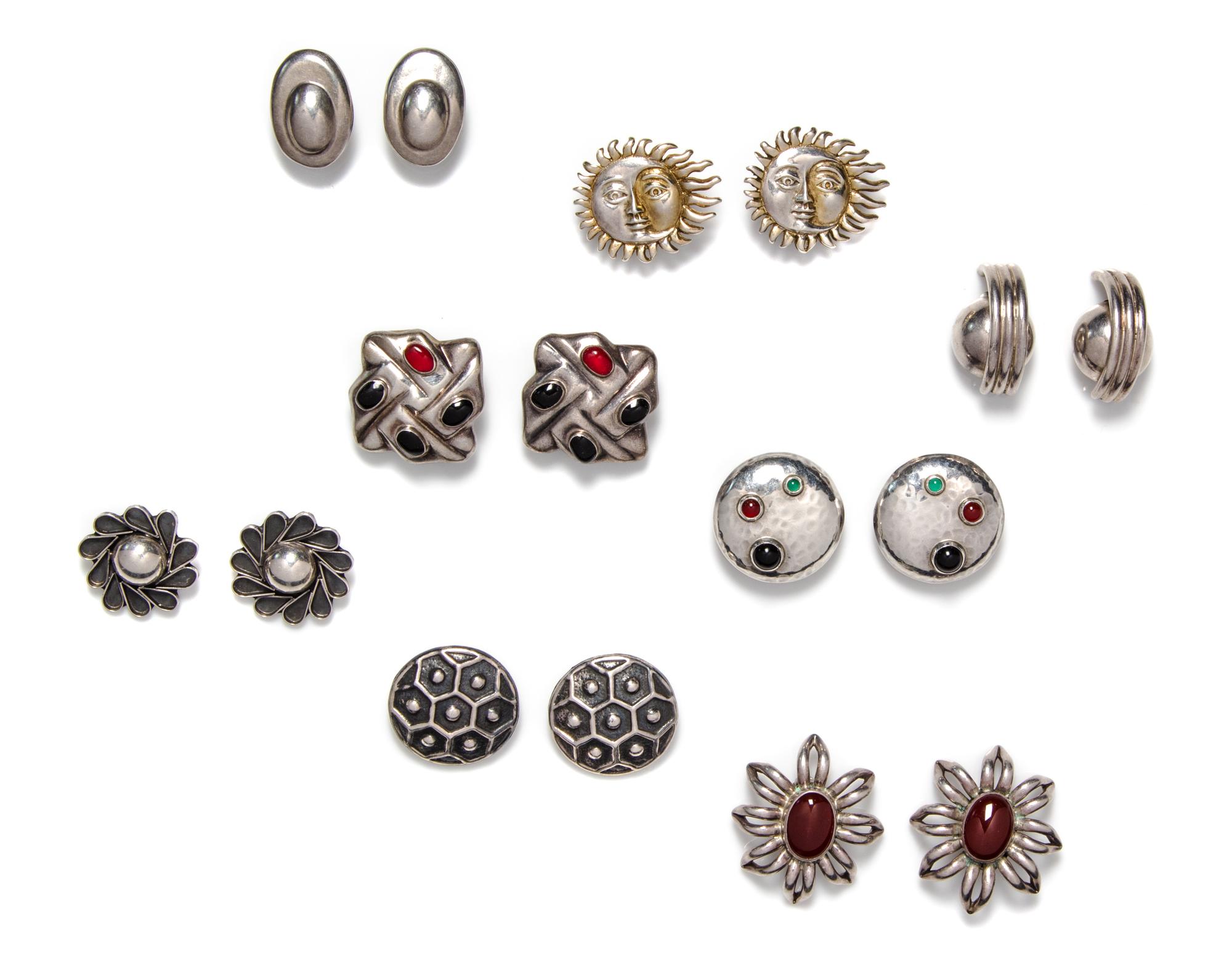 A Collection of Sterling Silver Earclips, 124.40 dwts.