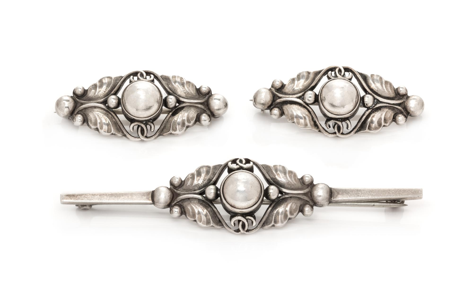 A Collection of Sterling Silver Foliate Motif Brooches, Georg Jensen, 9.90 dwts.
