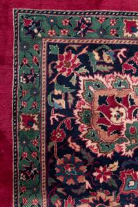 A Kashan Wool Rug