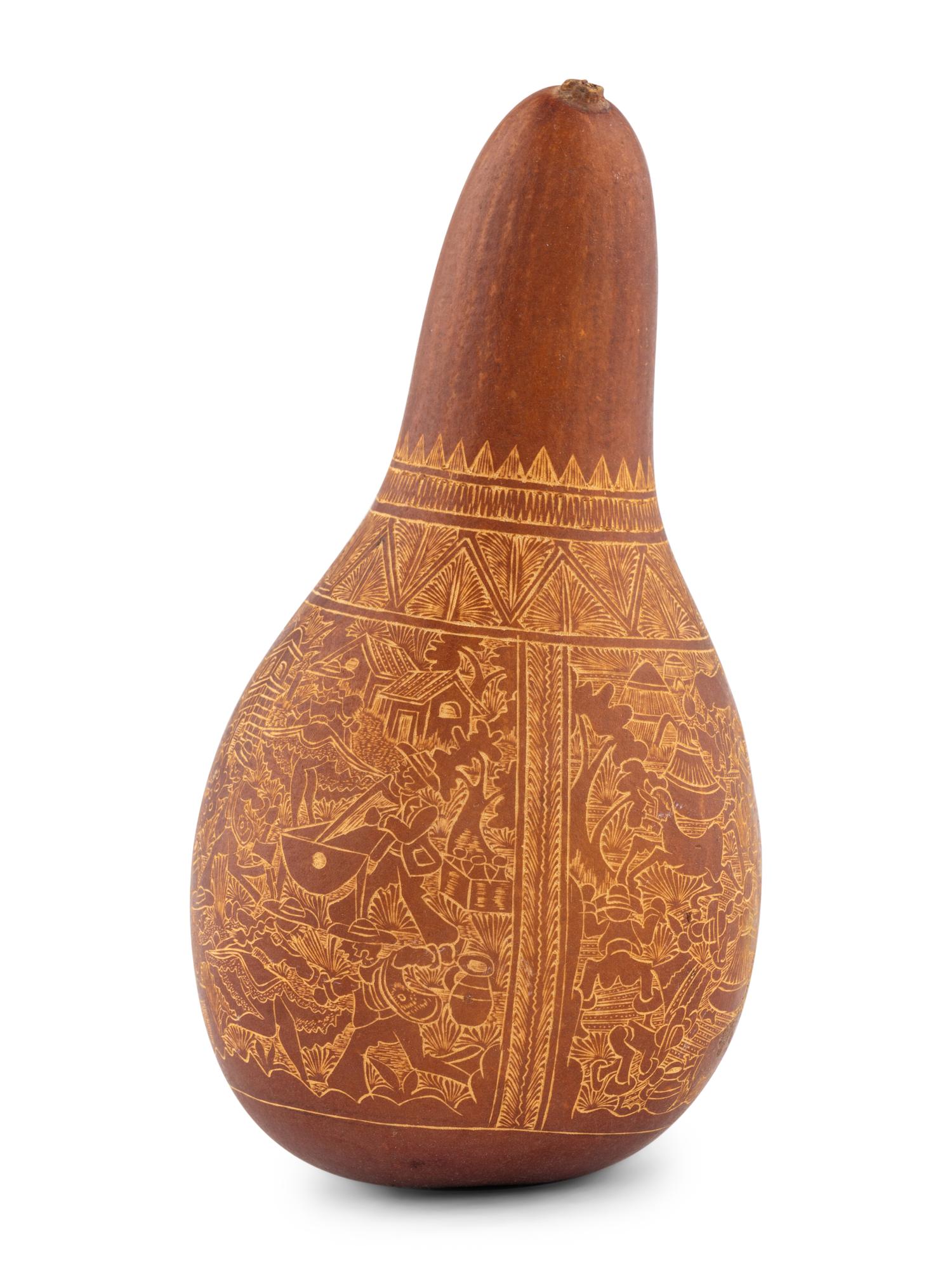 A Carved Gourd Rattle