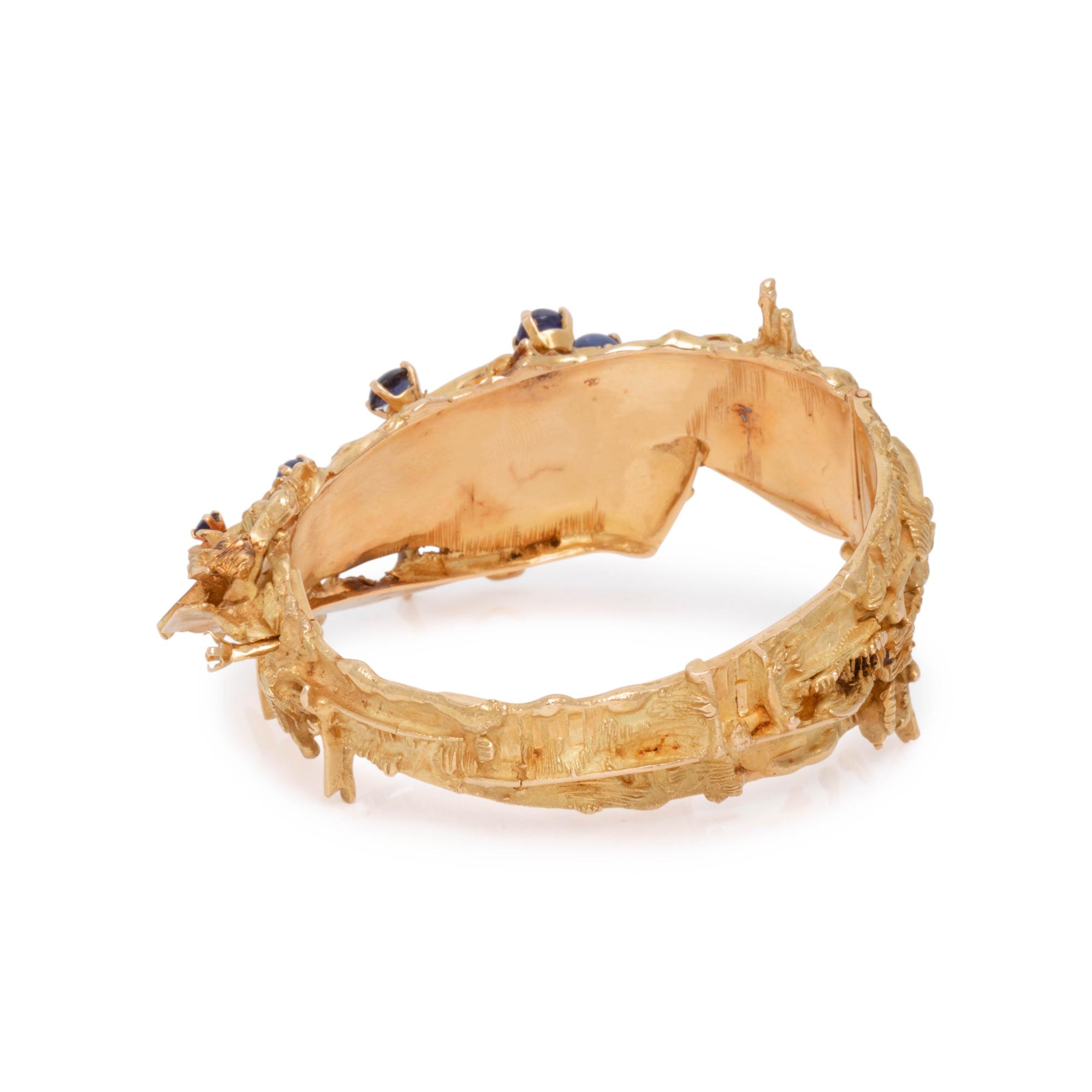 AURELIO TENO, BRUTALIST YELLOW GOLD AND SAPPHIRE BANGLE BRACELET