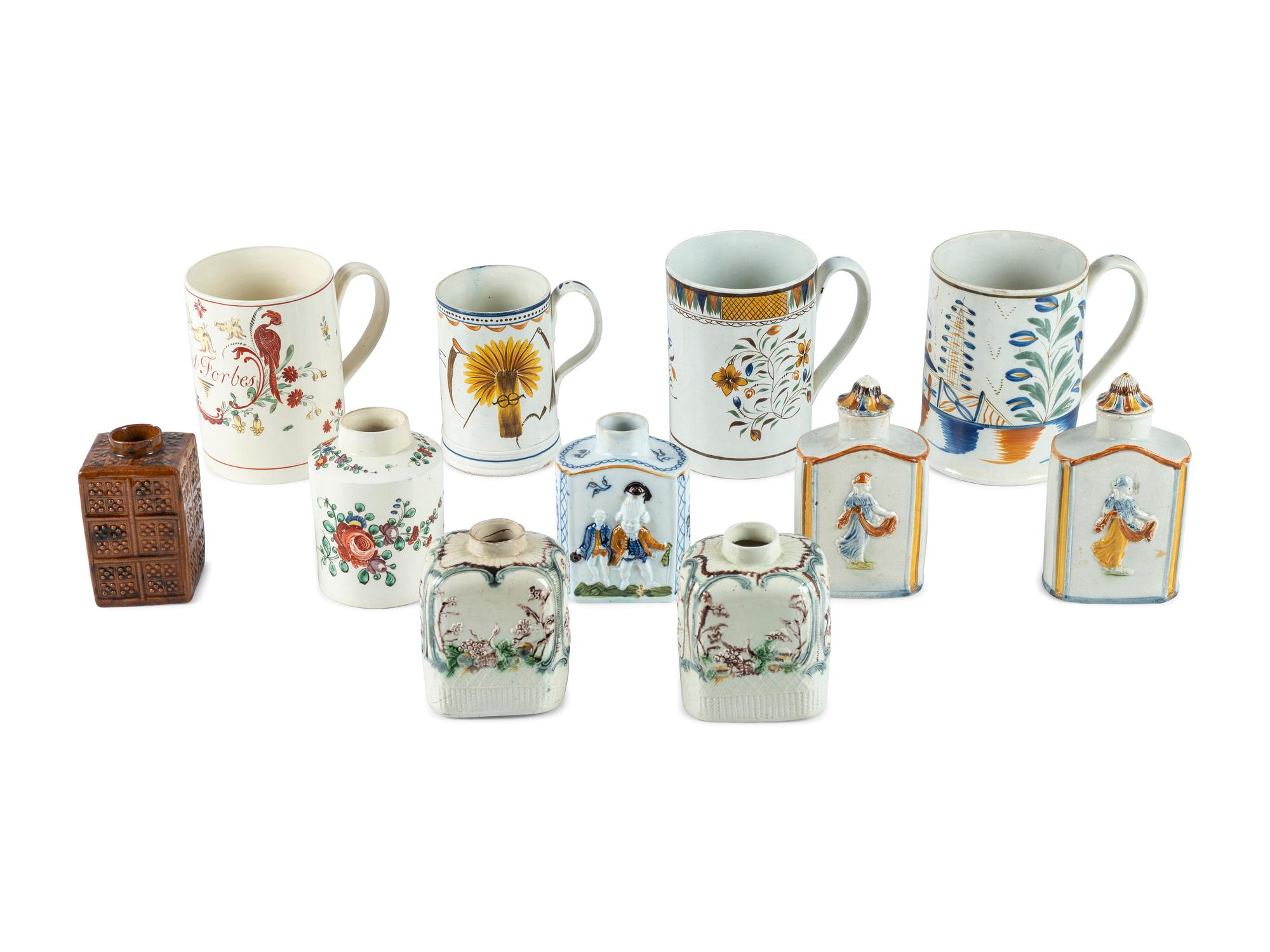 A Group of English Molded Creamware and Pearlware Glazed Tea Caddies and Canns