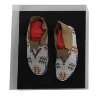 A Pair of Sioux Mocassins Length 10 1/2 inches — CIRCA 1920
