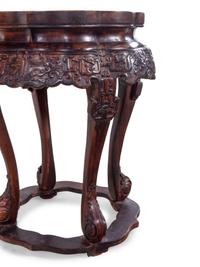 A Pair of Chinese Lacquered Hardwood Flori-Form Stools