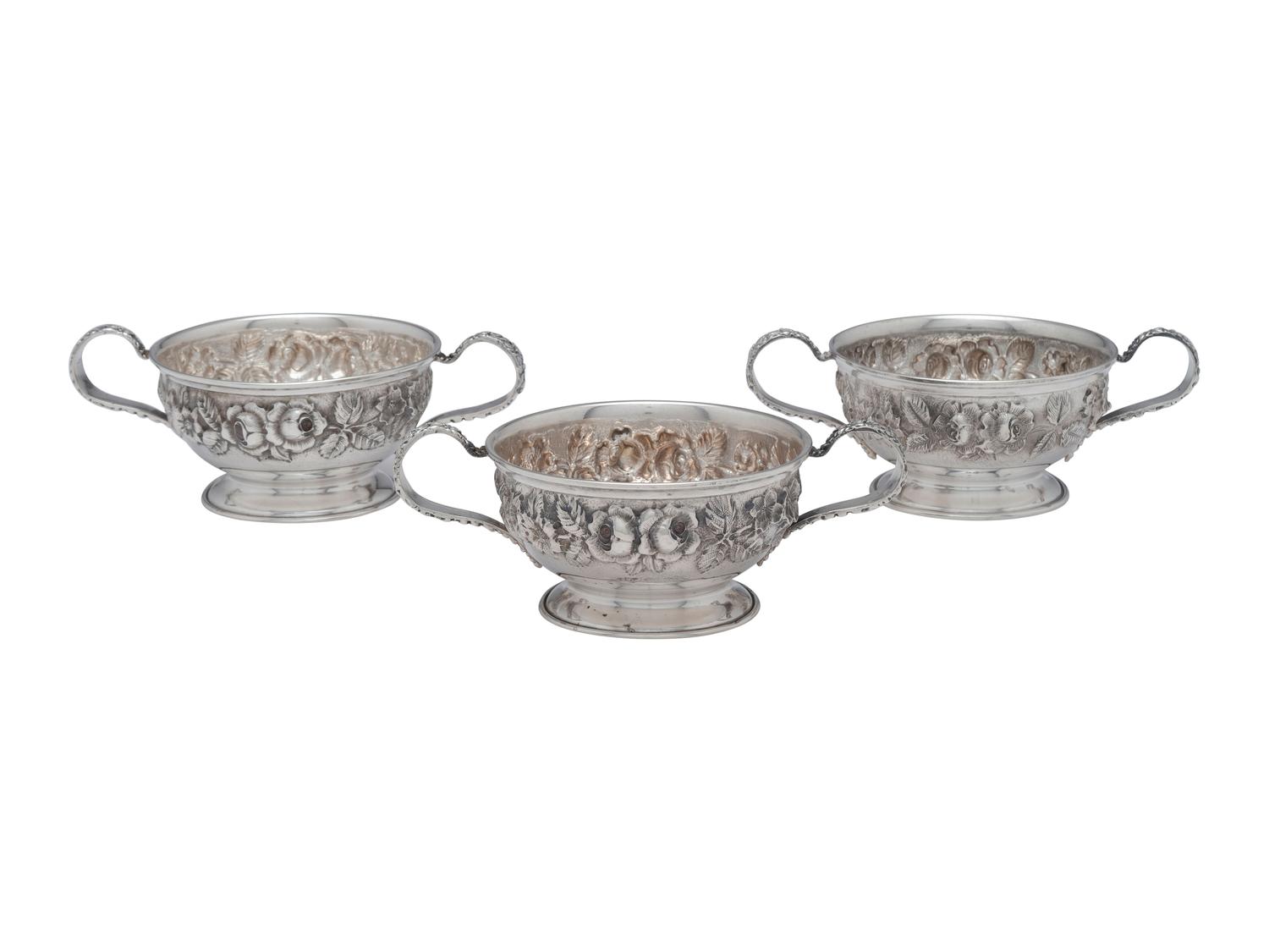 Thirteen American Repousse Silver Bouillon Holders