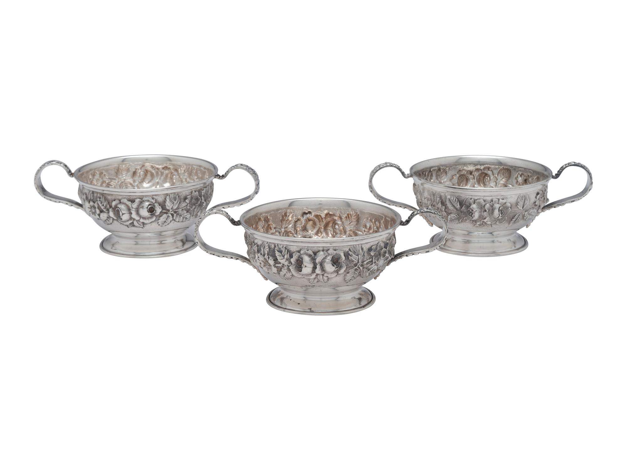 Thirteen American Repousse Silver Bouillon Holders