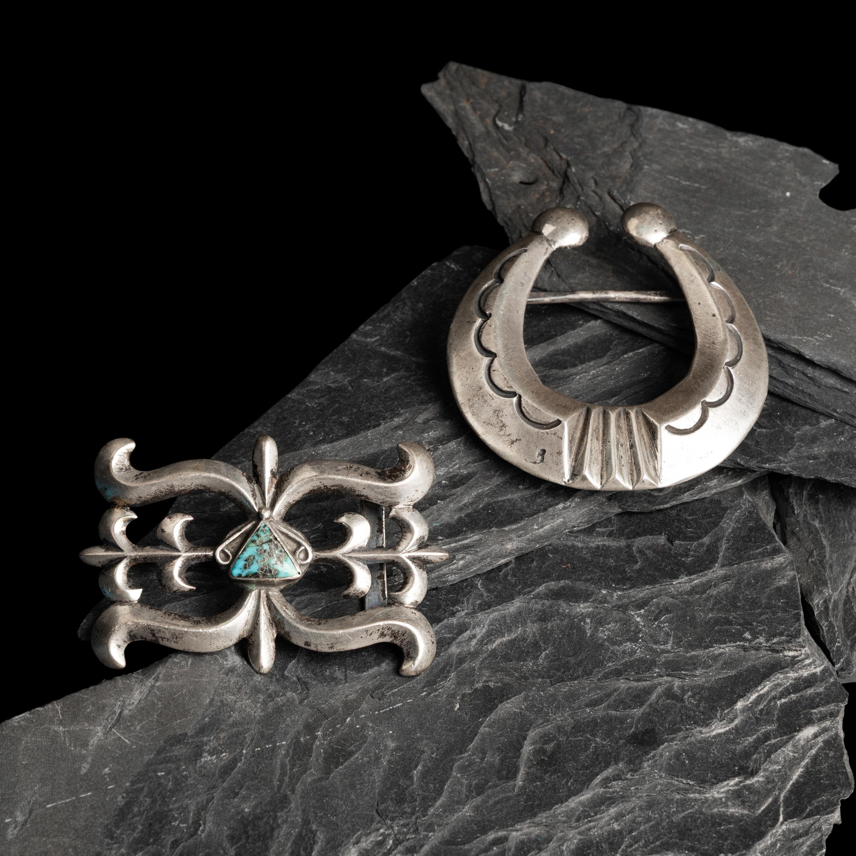 Pair of Navajo Sandcast Silver Belt Buckles