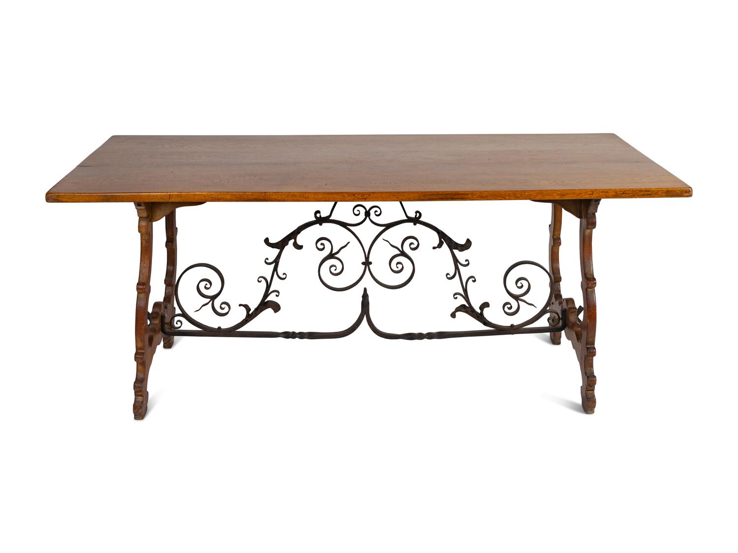 A Spanish Baroque Style Iron-Mounted Oak Trestle Table
