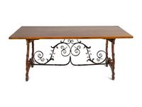 A Spanish Baroque Style Iron-Mounted Oak Trestle Table