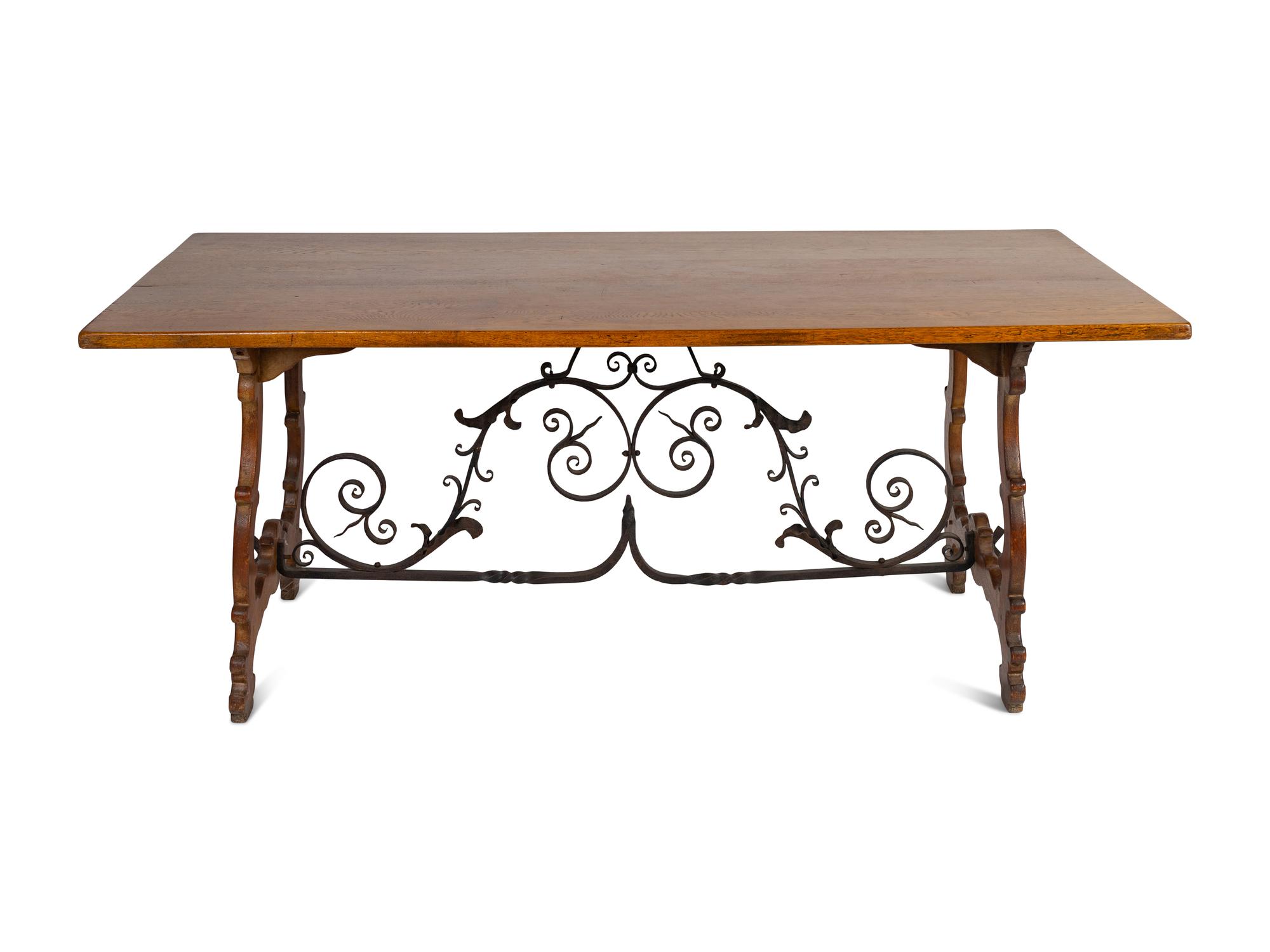A Spanish Baroque Style Iron-Mounted Oak Trestle Table