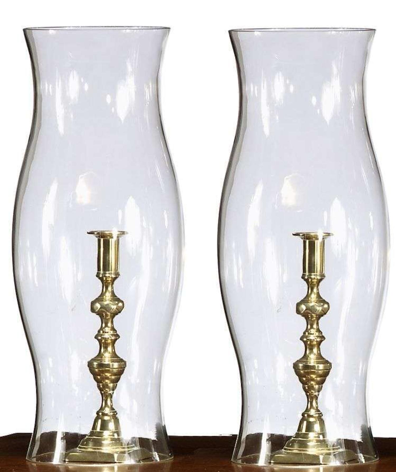 Pair of brass candlesticks with hurricane shades 19th/20th century