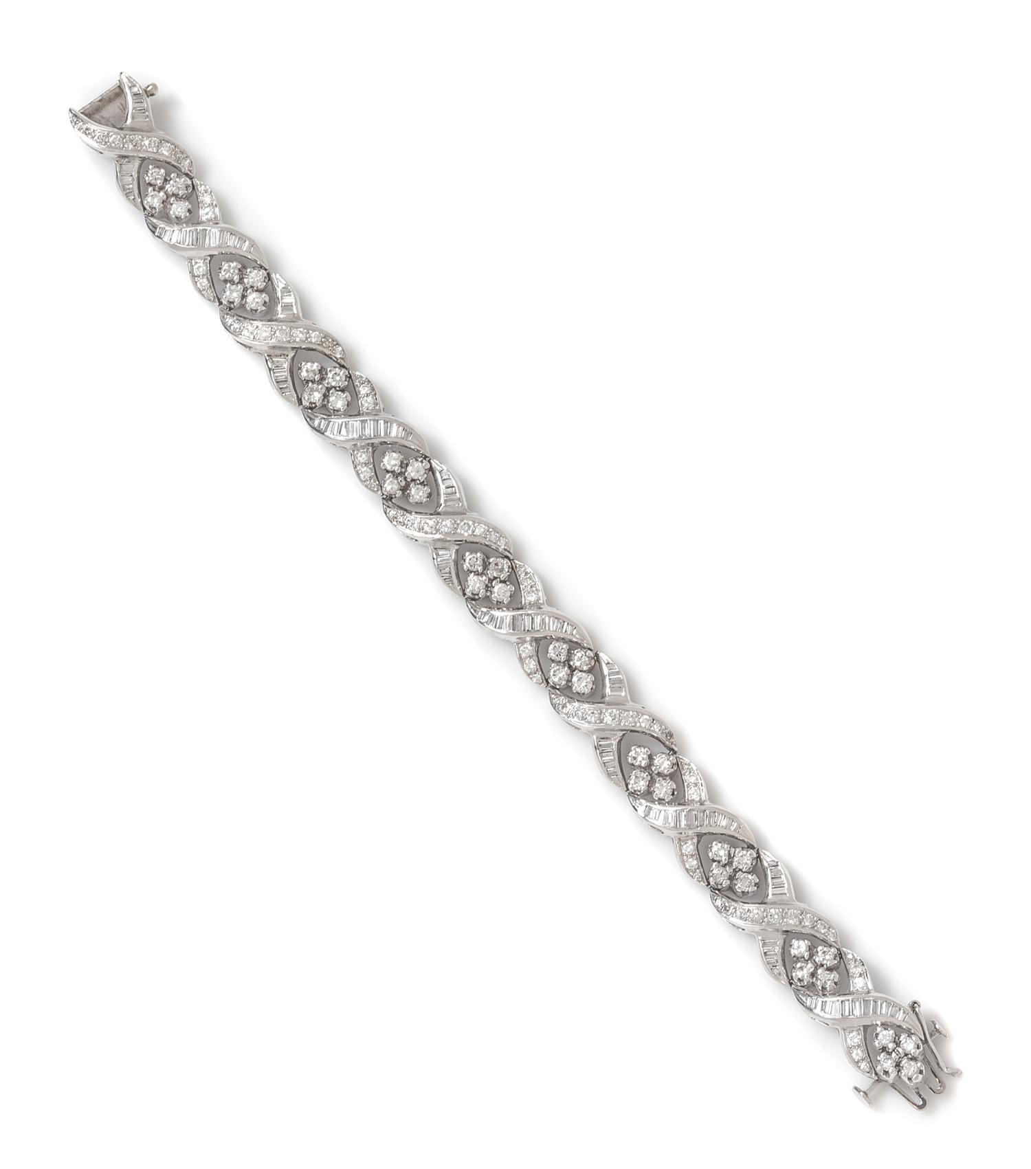 A Platinum, White Gold and Diamond Bracelet, 24.80 dwts.