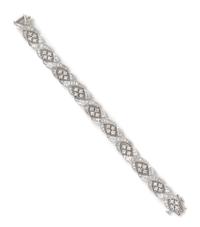 A Platinum, White Gold and Diamond Bracelet, 24.80 dwts.