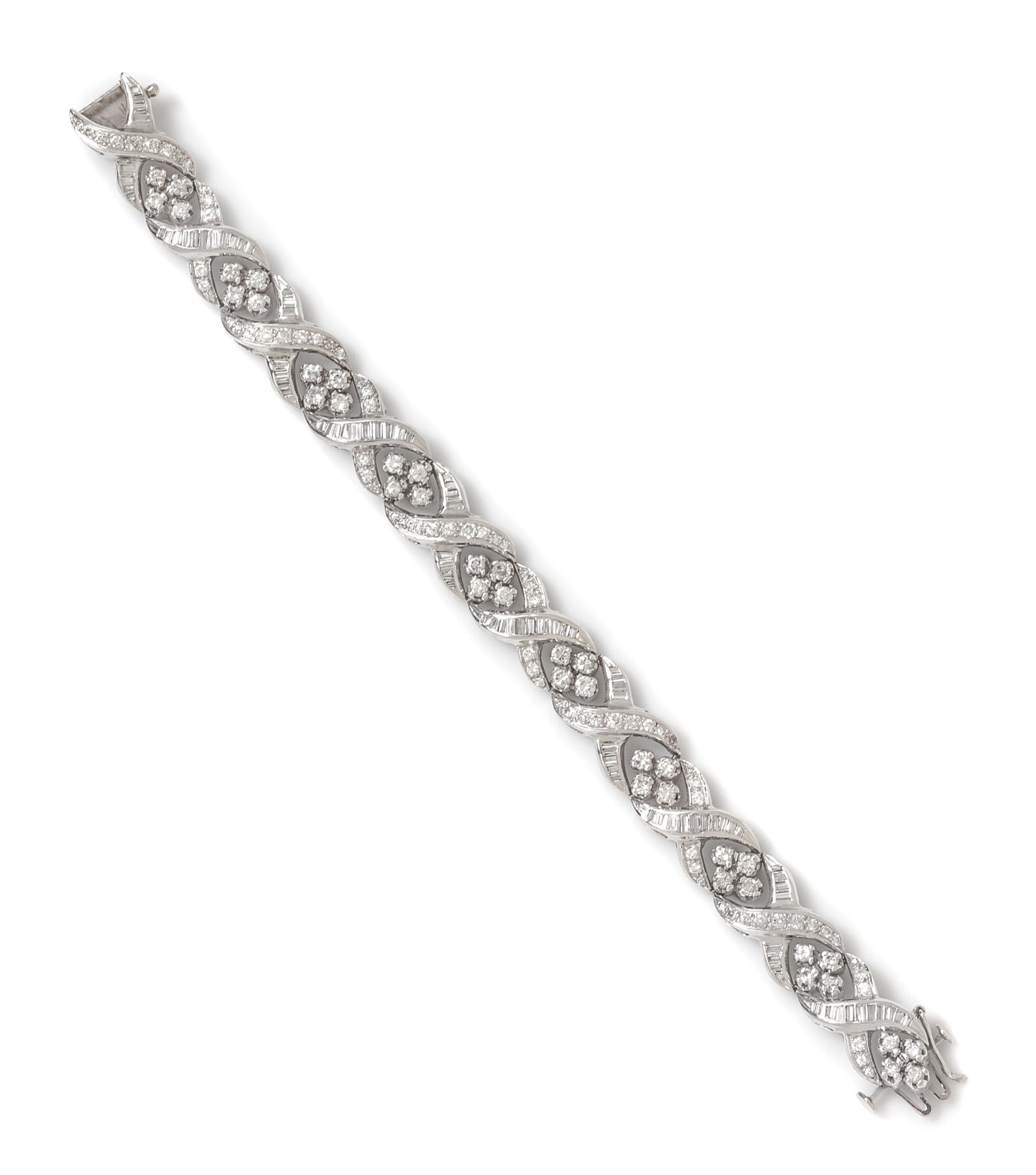 A Platinum, White Gold and Diamond Bracelet, 24.80 dwts.