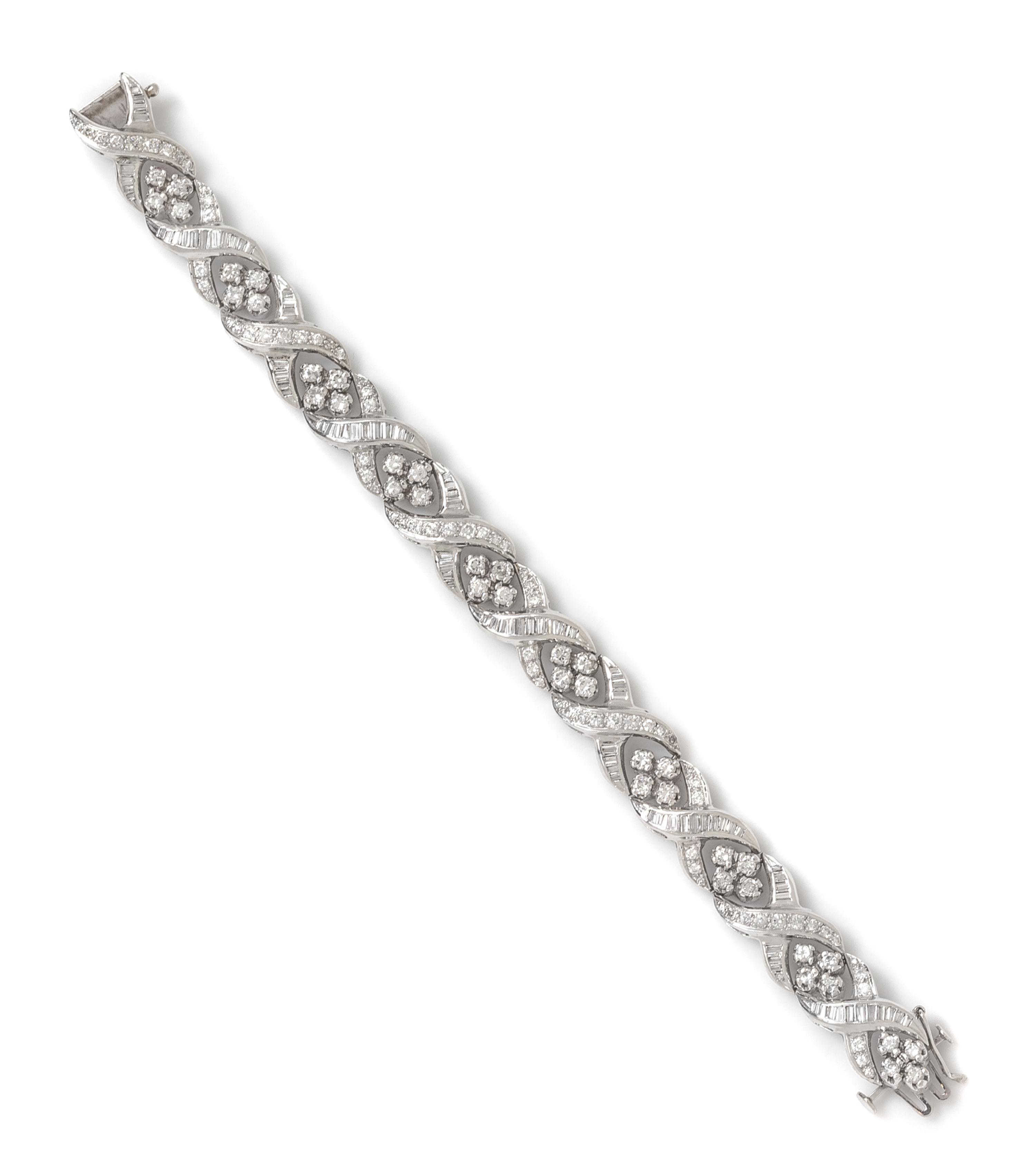 A Platinum, White Gold and Diamond Bracelet, 24.80 dwts.