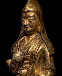 A Tibetan Gilt Bronze Repoussé Seated Figure of Tsongkhapa