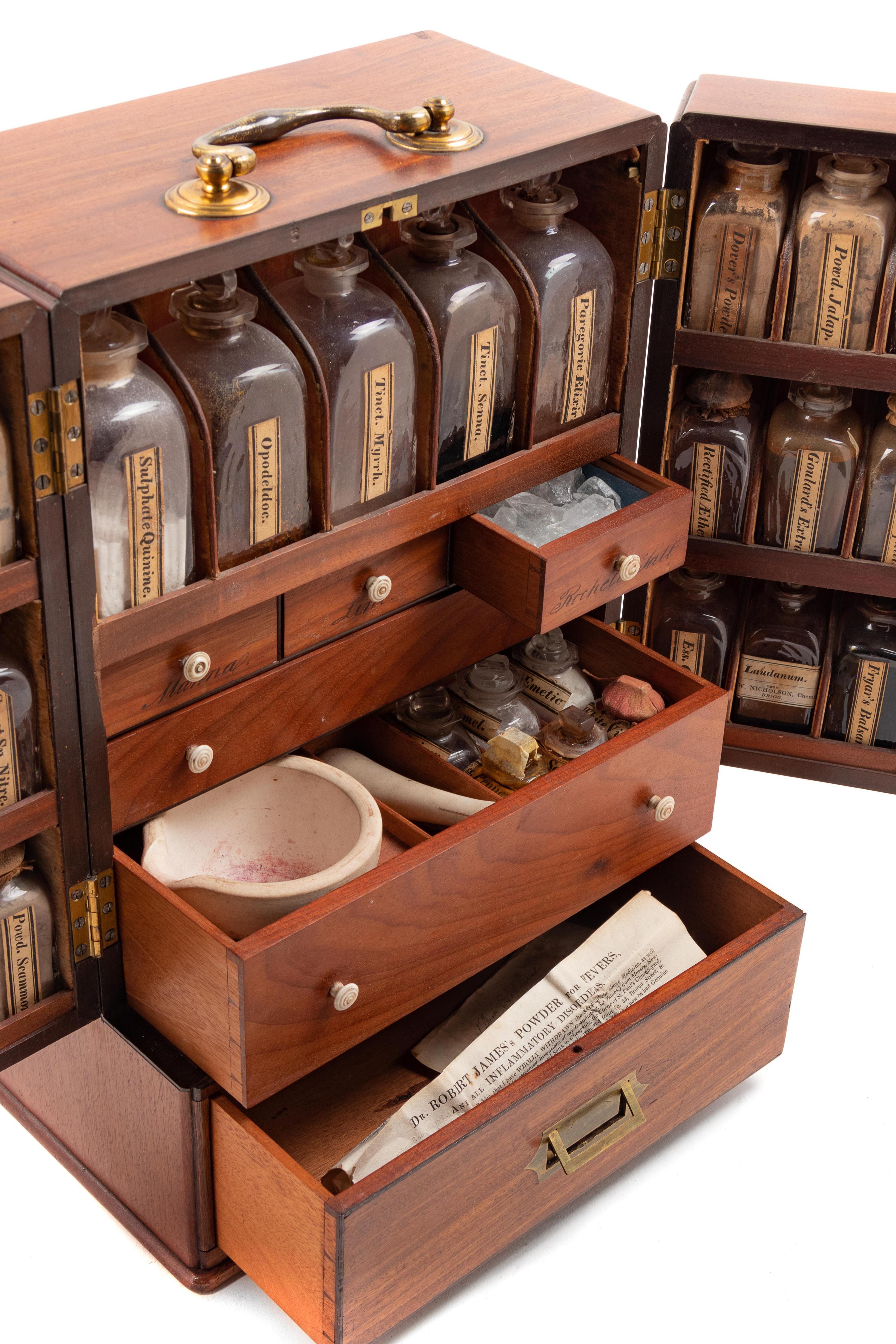 A Regency Figured Mahogany Travelling Apothecary Chest