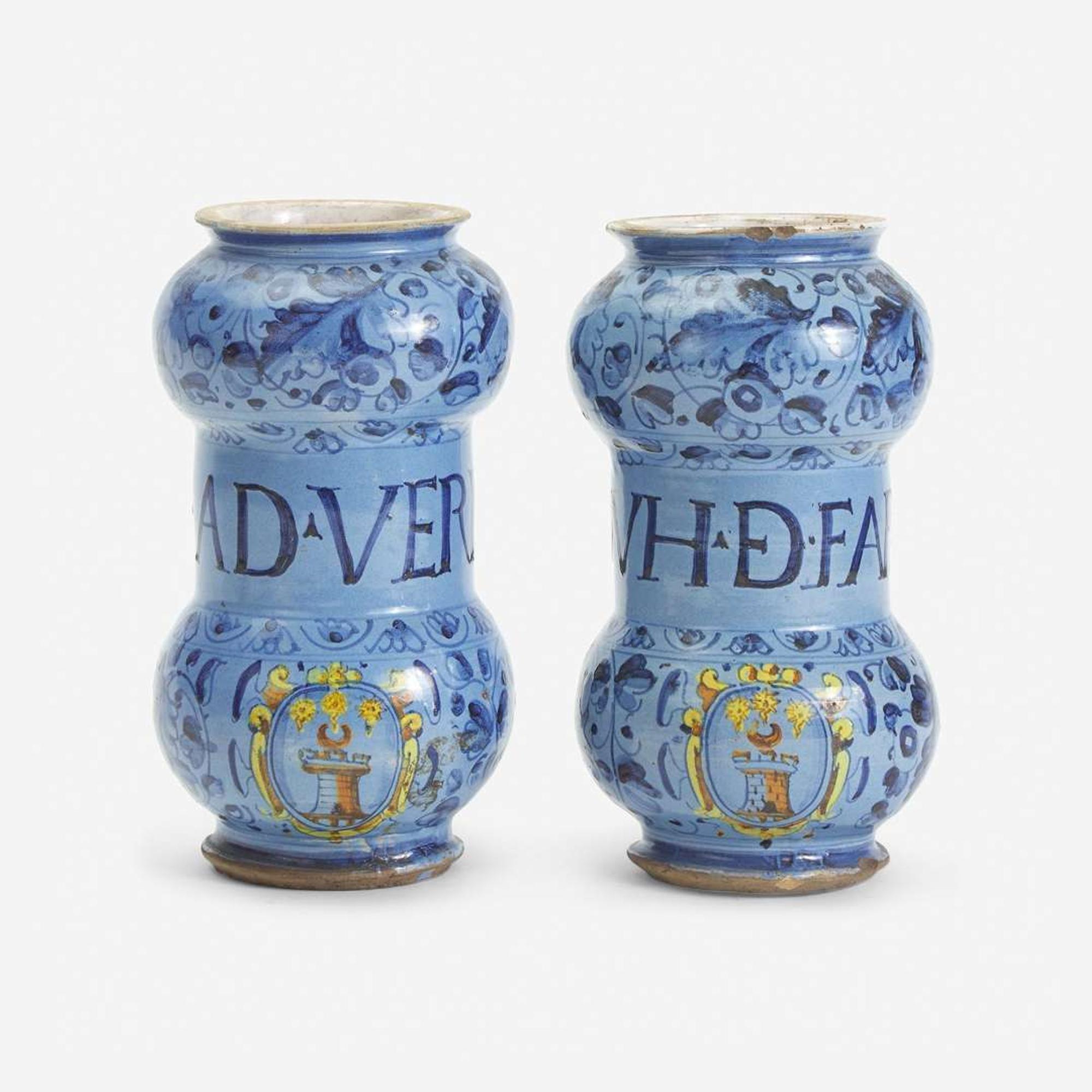 A Pair of Italian Tin-Glazed Earthenware 'Berrettino' Armorial Albarelli Venice, first half 16th century