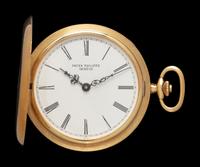 PATEK PHILIPPE, 18K YELLOW GOLD POCKET WATCH WITH CHAIN AND CHARM