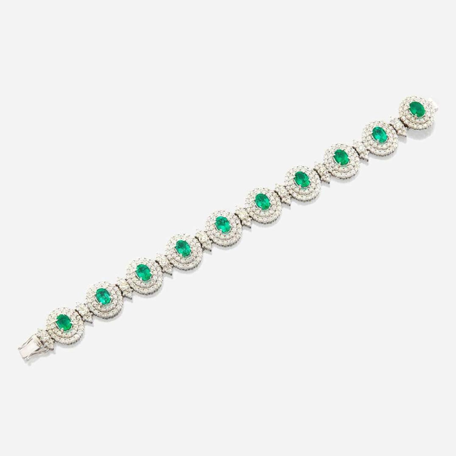 An emerald, diamond, and white gold bracelet