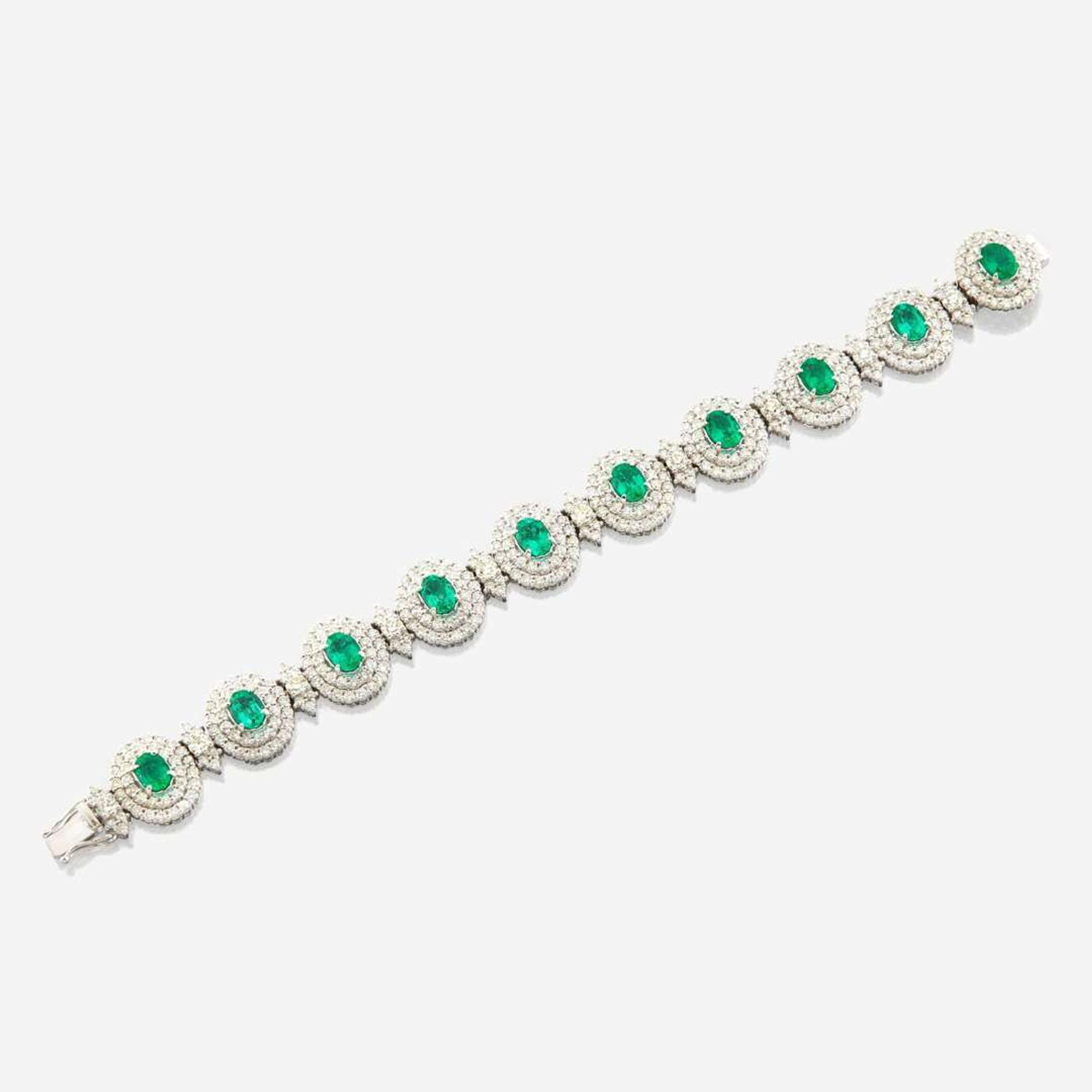 An emerald, diamond, and white gold bracelet
