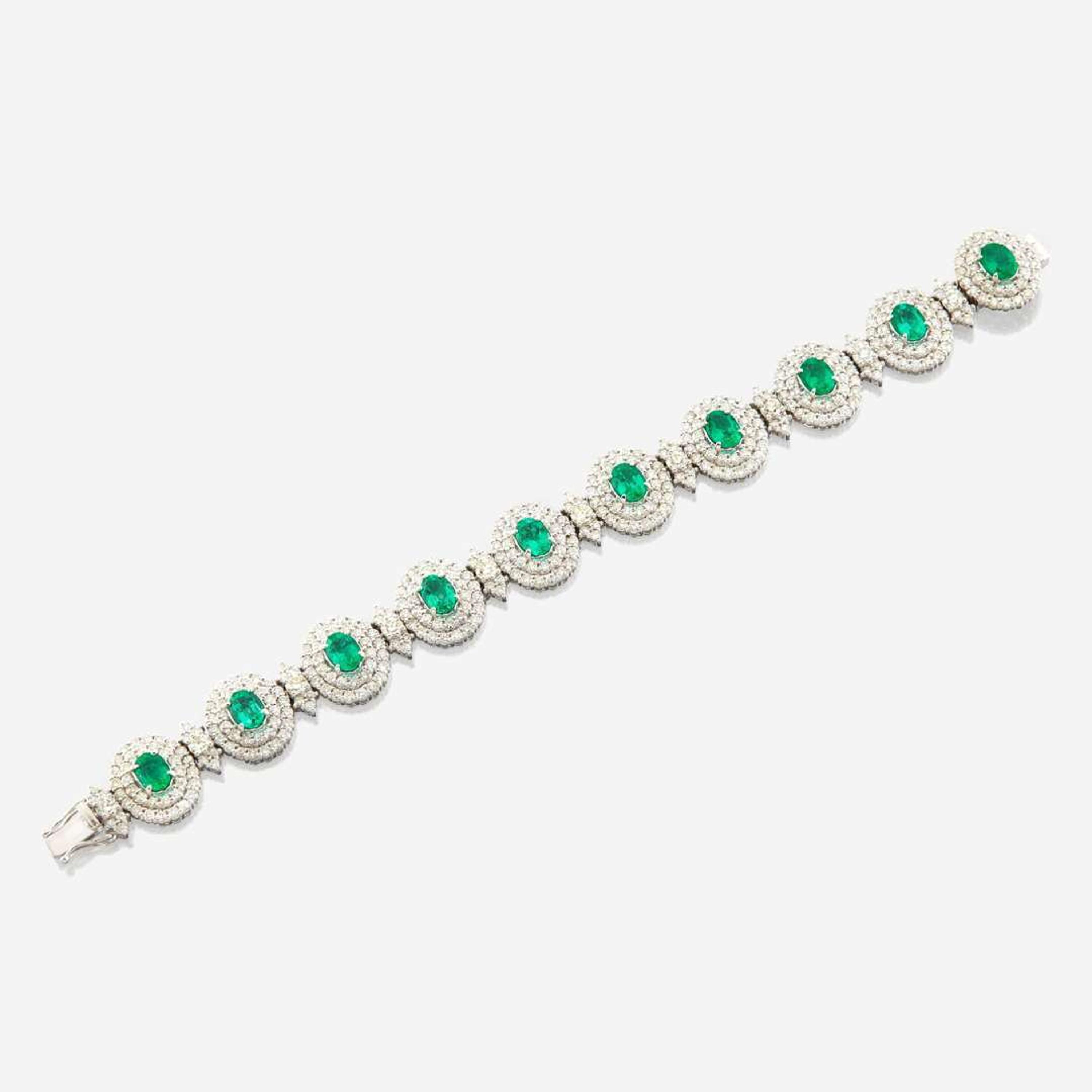 An emerald, diamond, and white gold bracelet