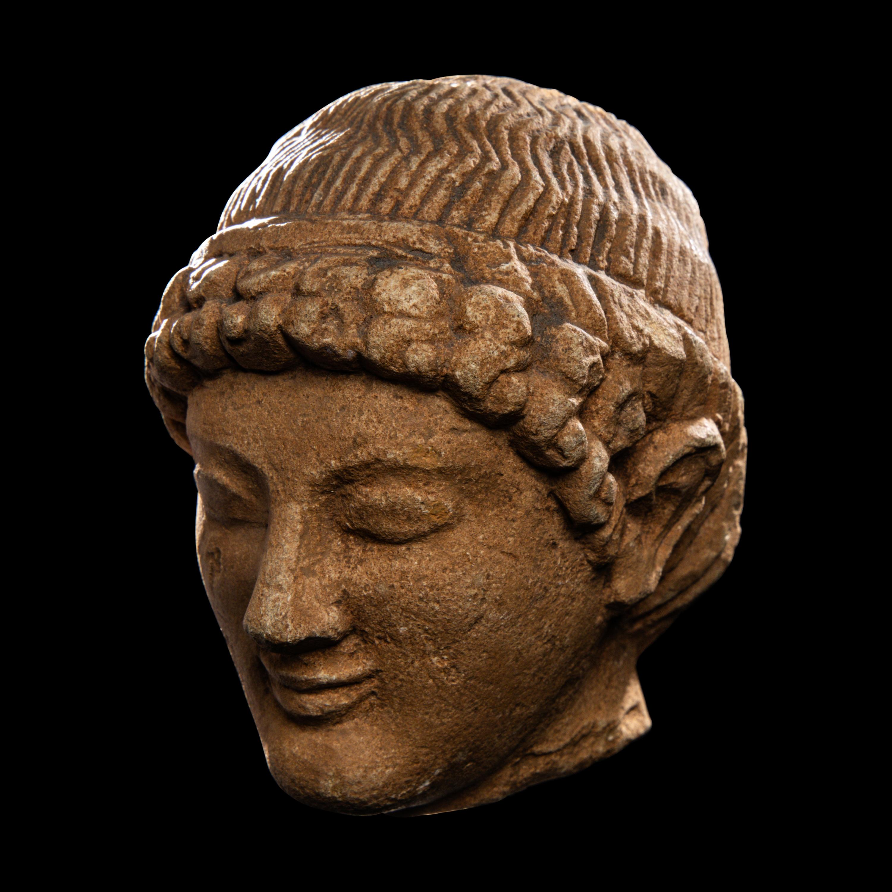 A Cypriot Limestone Head of a Youth