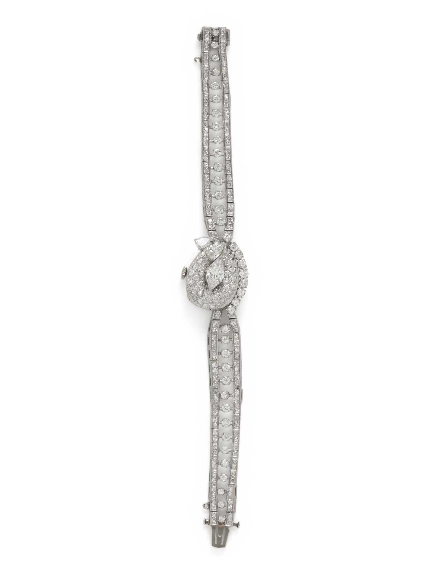 HAMILTON, PLATINUM AND DIAMOND SURPRISE WATCH