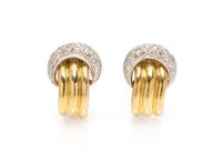 A Pair of 14 Karat Gold and Diamond Clips, 6.80 dwts.