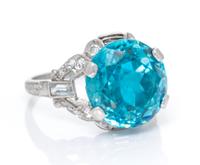 An Art Deco Platinum, Blue Zircon, White Sapphire and Diamond Ring, 4.40 dwts.