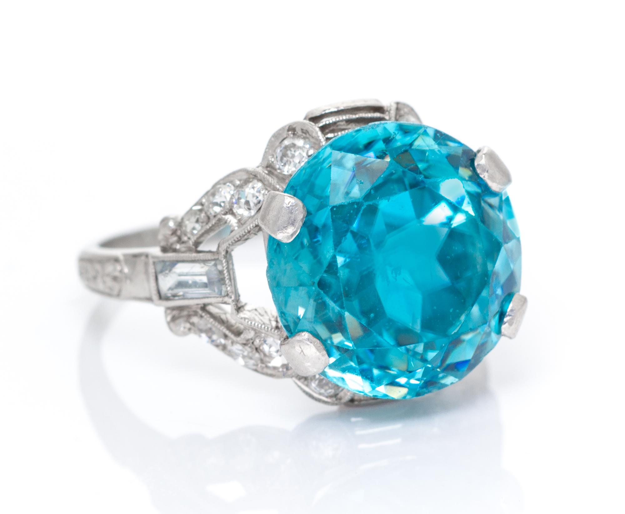 An Art Deco Platinum, Blue Zircon, White Sapphire and Diamond Ring, 4.40 dwts.