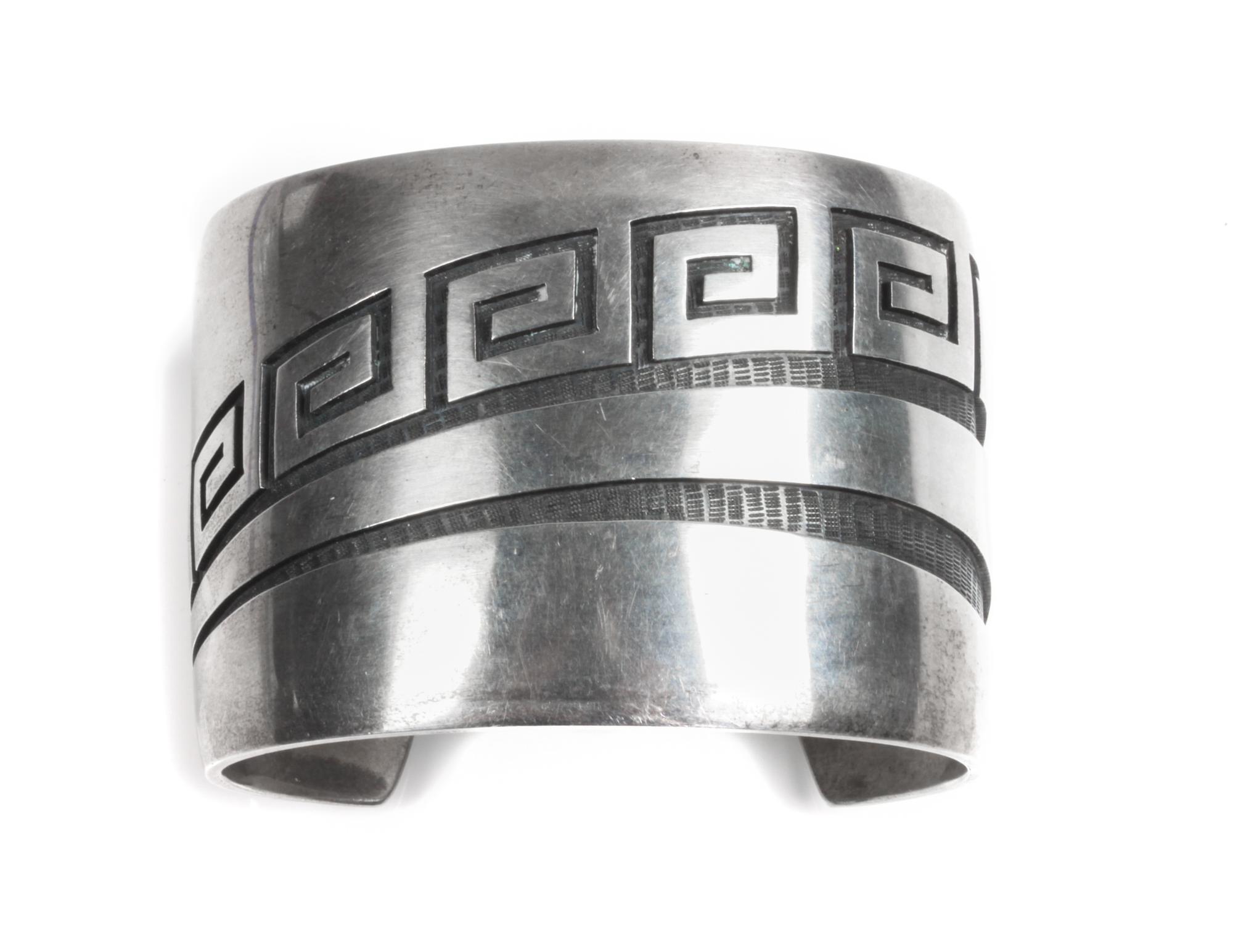 Lawrence Saufkie (Hopi, 1934-2011) Silver Overlay Cuff Bracelet Length 5 7/8 x opening 1 1/4 x width 1 3/4 inches