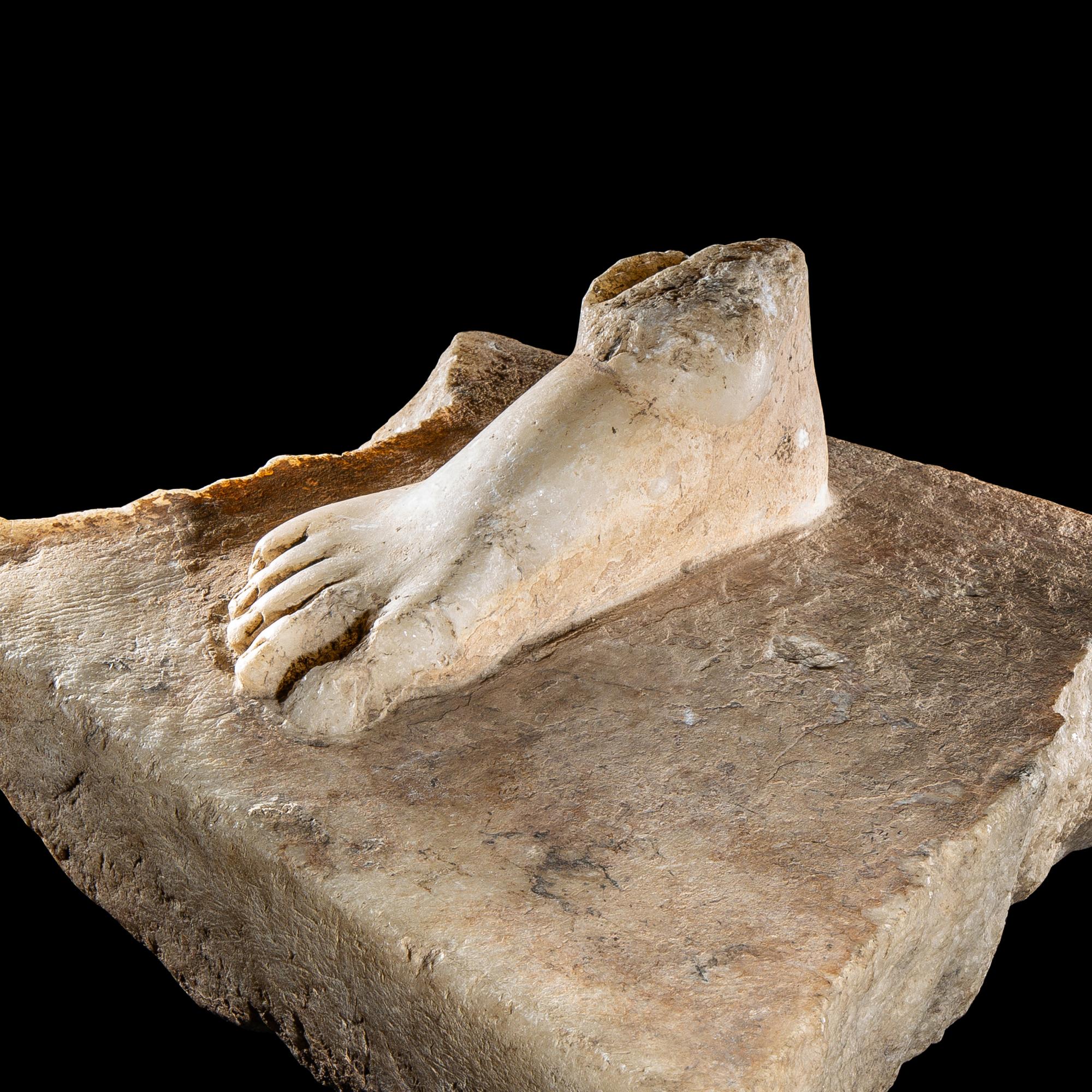A Roman Marble Base Fragment with a Right Foot