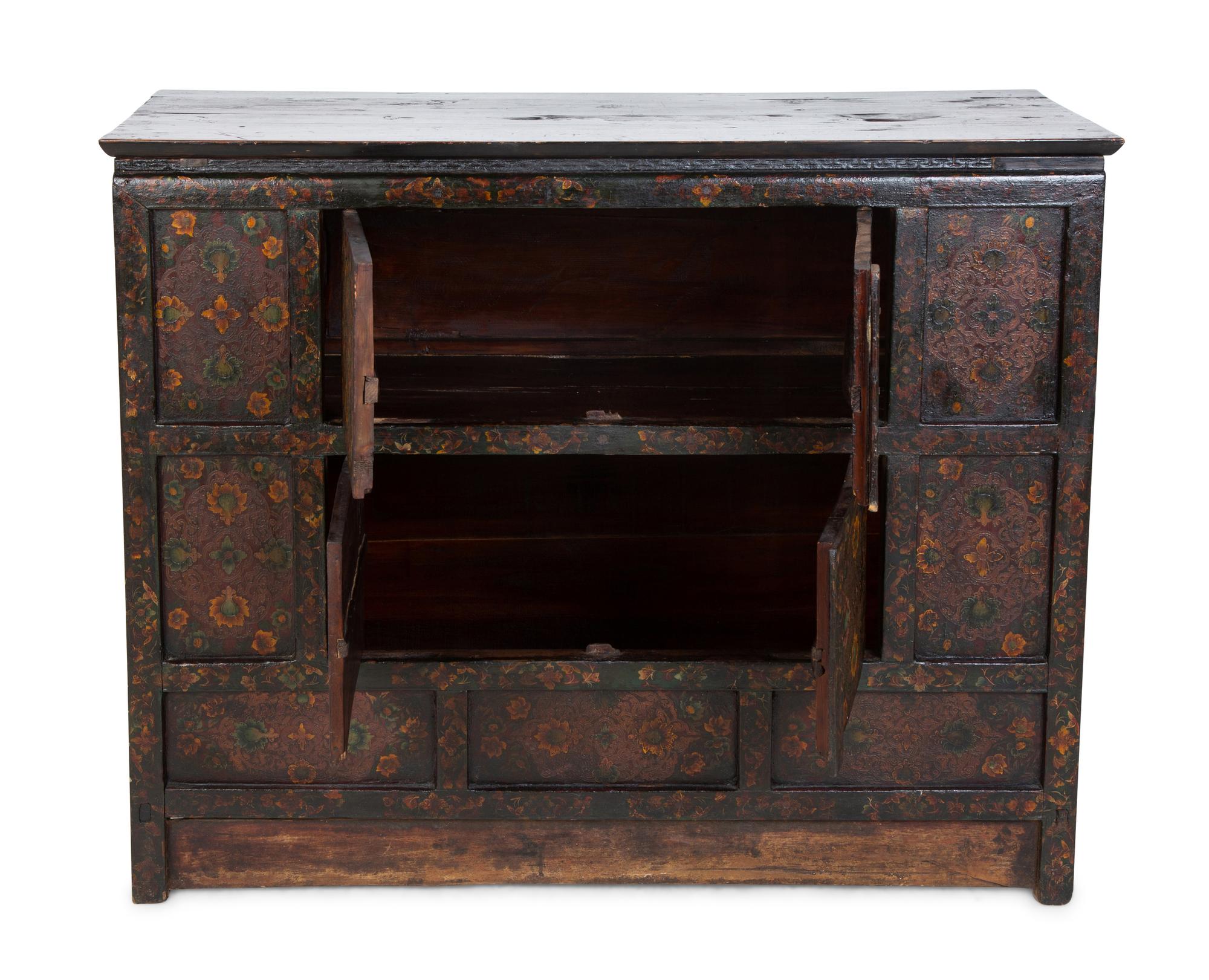 A Tibetan Lacquered and Tooled Pigskin Hall Chest — 20TH CENTURY