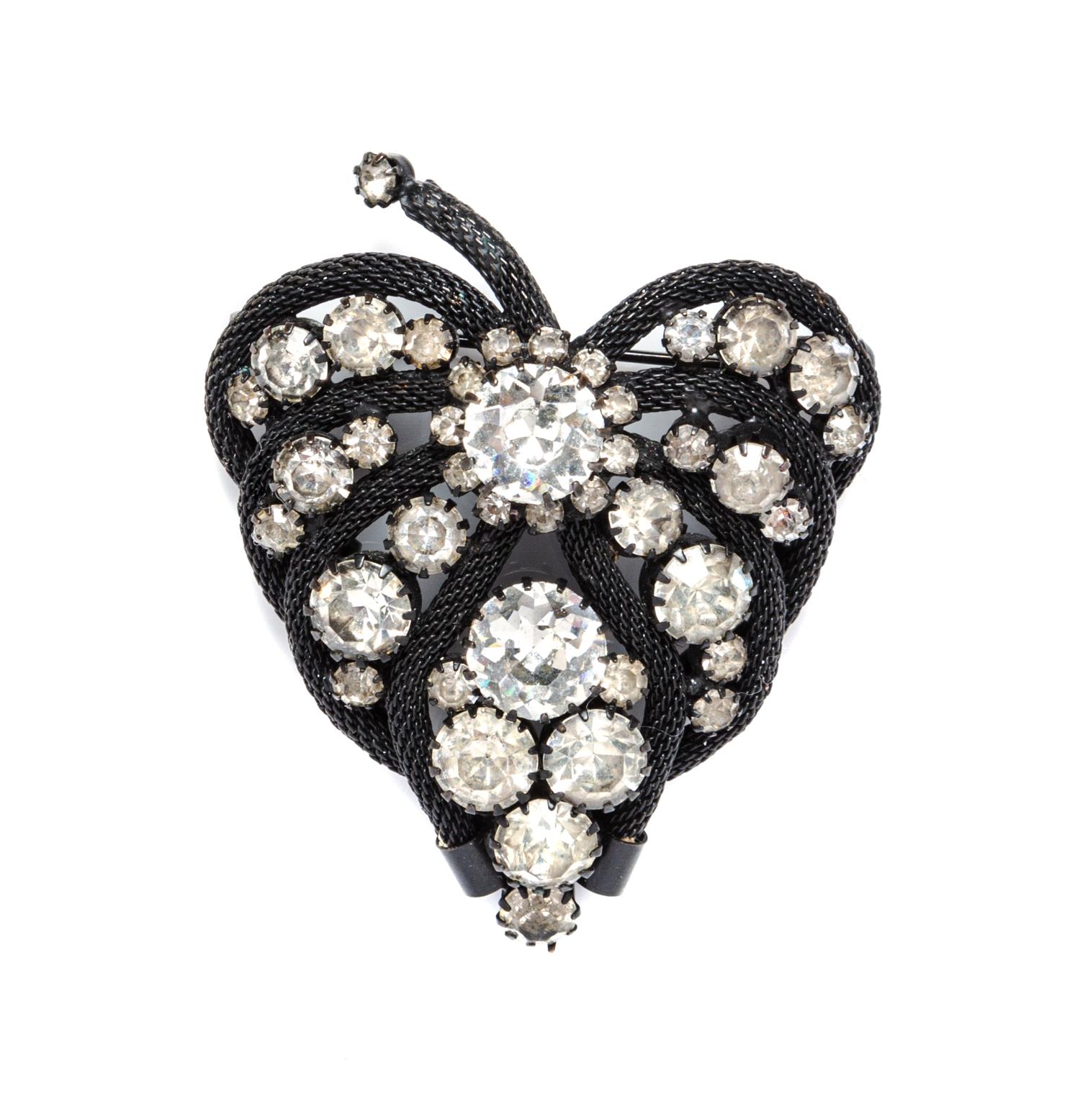 An Alice Caviness Black Mesh and Rhinestone Leaf Brooch.