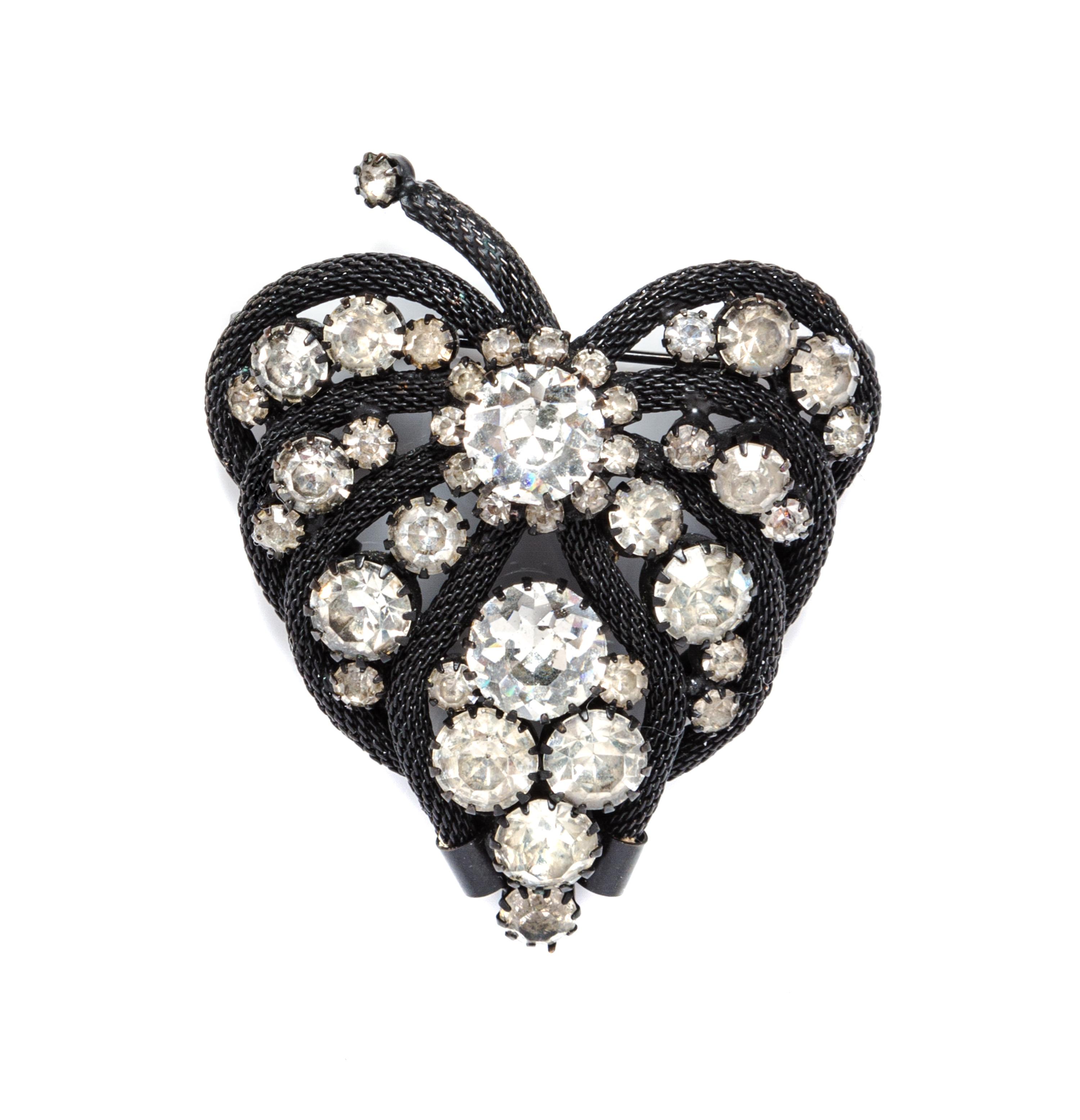 An Alice Caviness Black Mesh and Rhinestone Leaf Brooch.