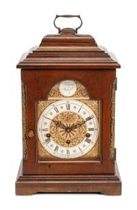 An English Mahogany Table Clock Height 16 1/2 x width 10 x depth 6 1/2 inches. — 19TH CENTURY