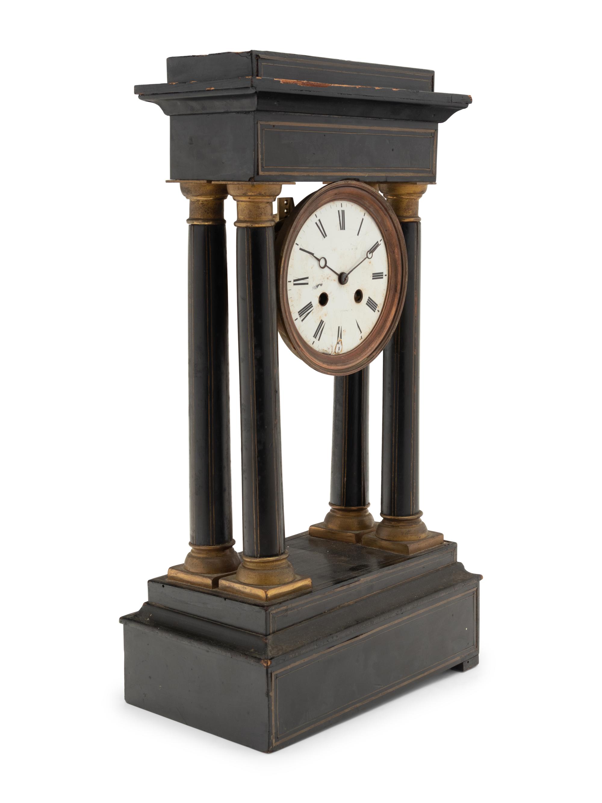 A Charles X Ebonized Mantel Clock
