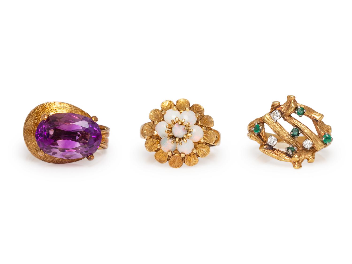 A Collection of 14 Karat Yellow Gold and Multigem Rings,